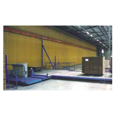 Conductor housing type RN7 for feed and control ofa traverse car in a carton processing plant.